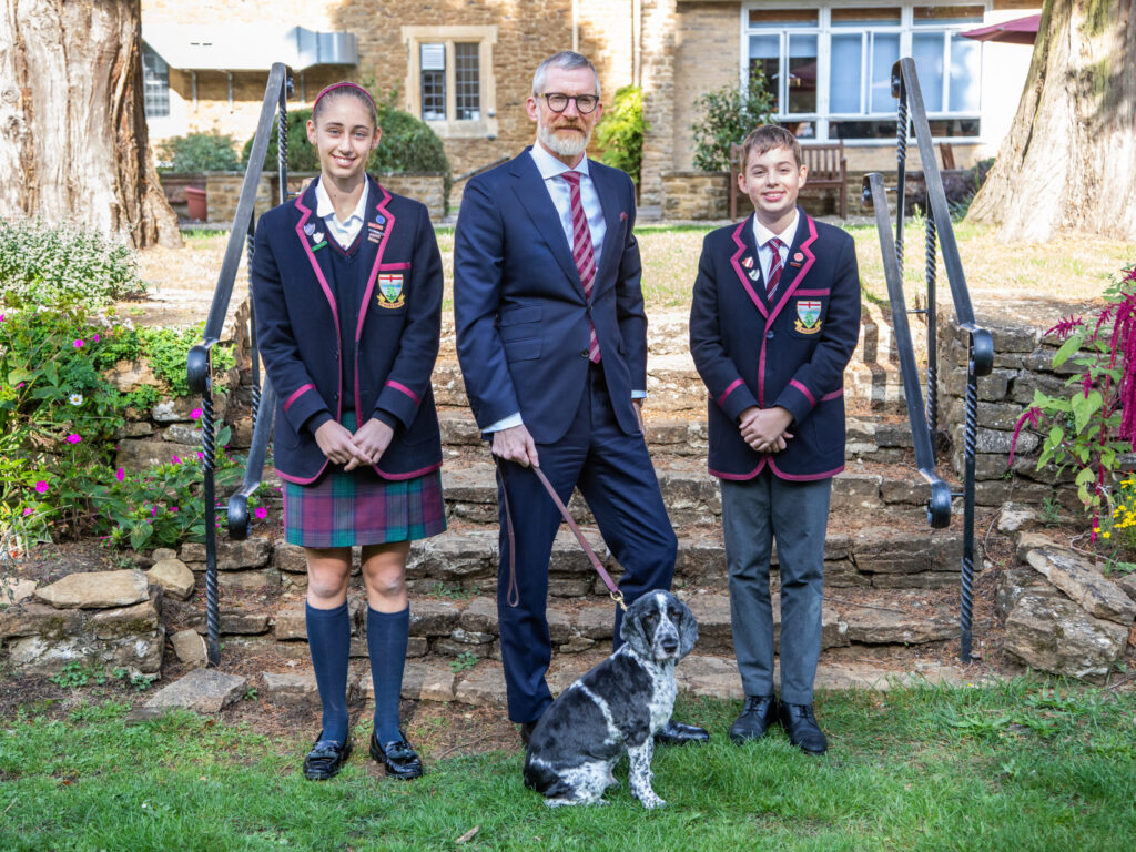 Head of School with 2 students