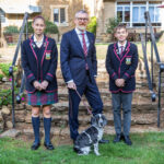 Head of School with 2 students