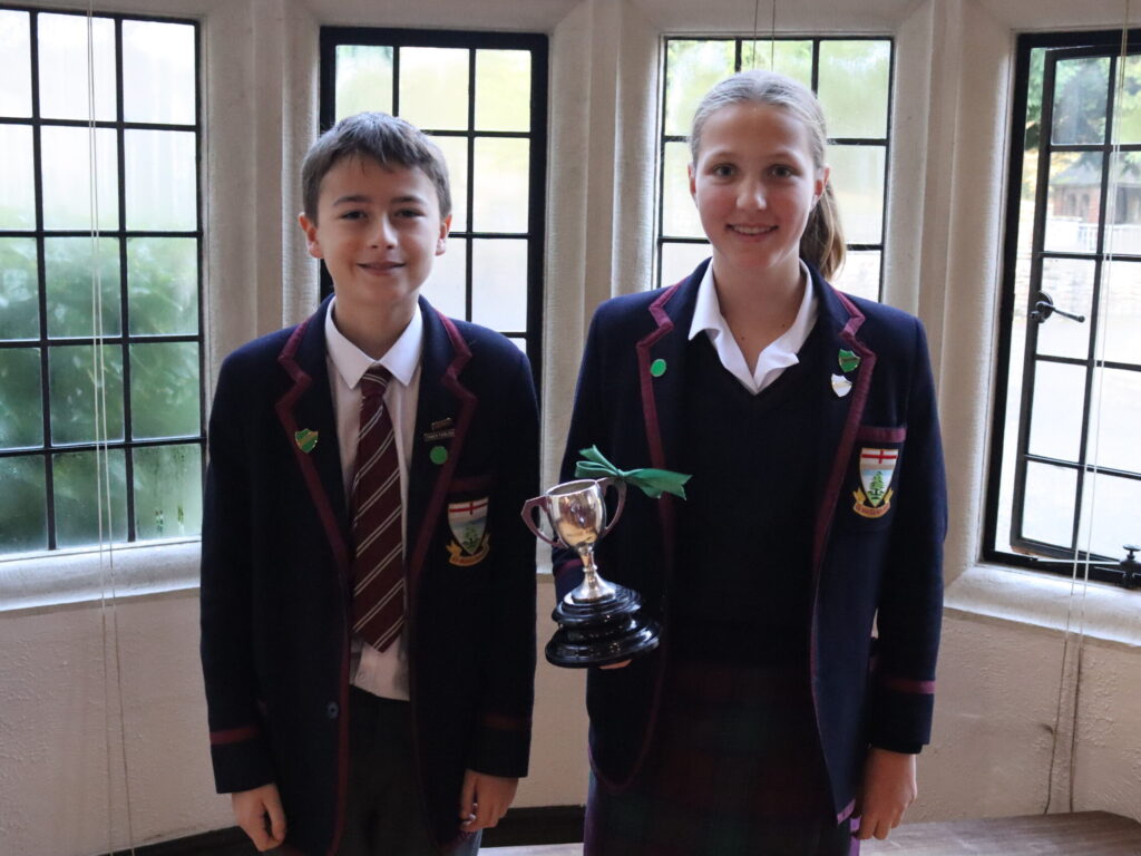 students holding a trophy