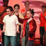 students on stage