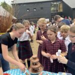 students around a chocolate fountain